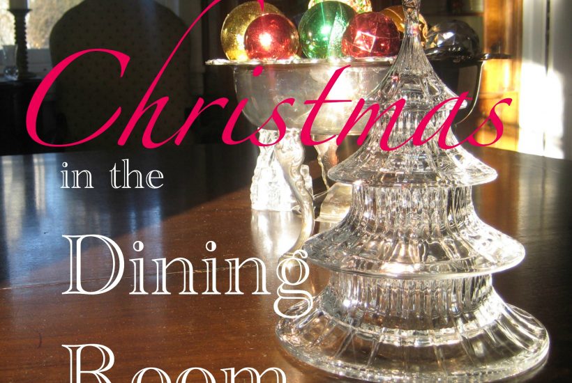 Simple yet elegant glass and silver decor with shiny Chritmas balls for the dining room table usong vintahe pieces