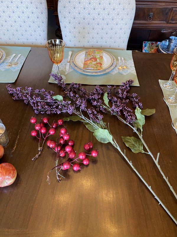 fall tablescape elements purple clusters and red berry faux stems