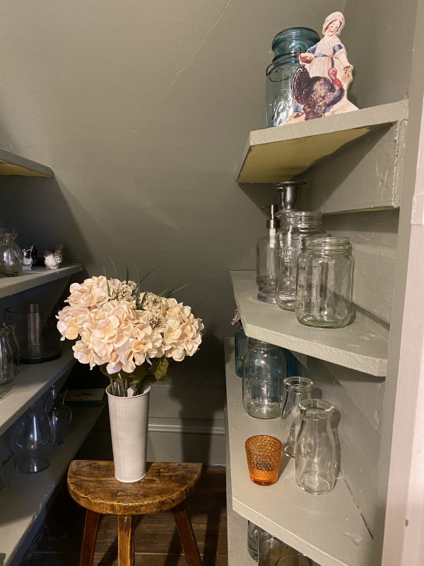 Funny Shelves in Powder Room Go Neutral