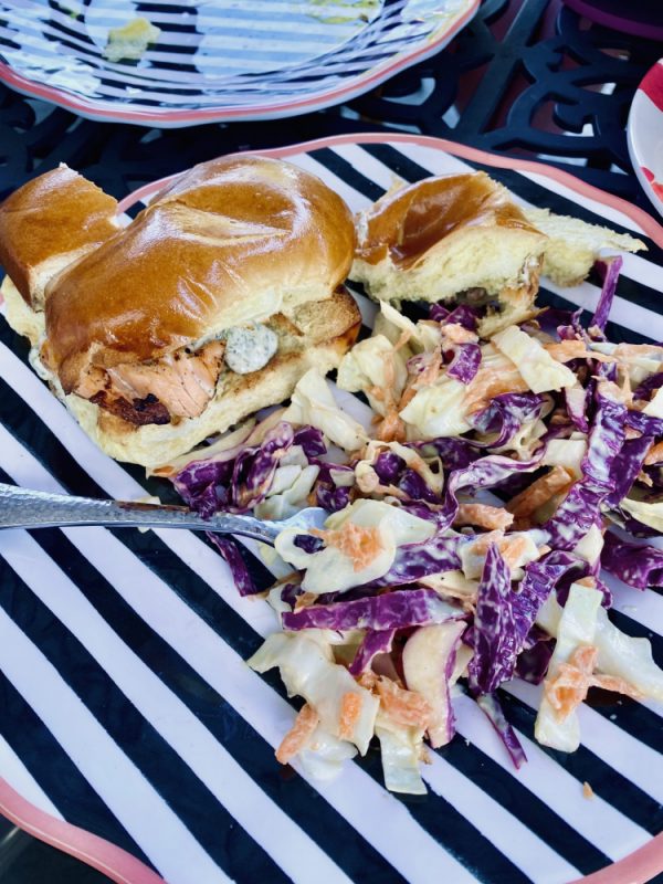 Salmon sandwich and speciality cole slaw