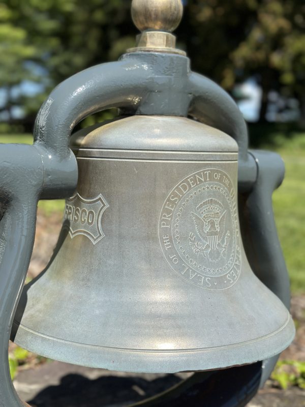 Seal of the President on bell in the back yard