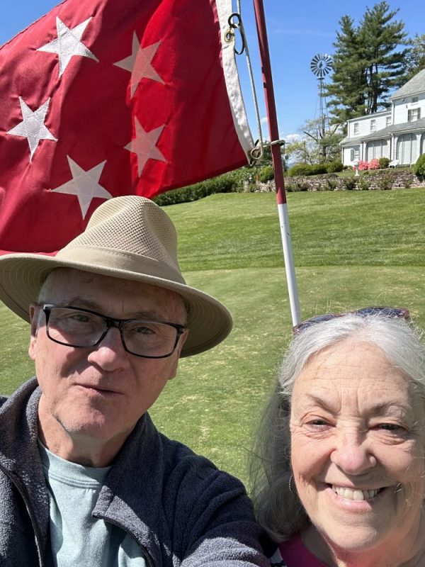 Jim and Linda on the Green with Ike's 5 Star Flag